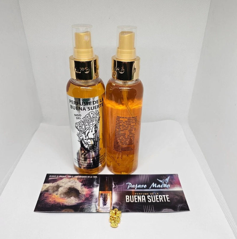 Perfume spray set with two amber bottles and a Buena Suerte booklet