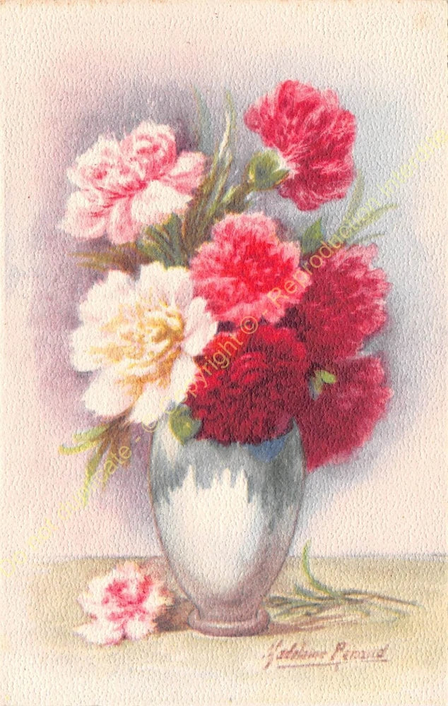 Carnation bouquet in a white vase with pink and red flowers