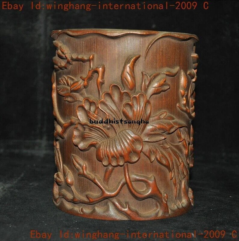 Carved wooden peony flower brush pot with decorative relief pattern