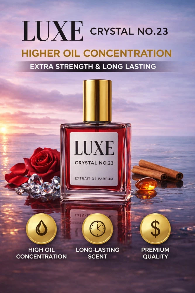 Luxe Crystal No.23 extrait de parfum bottle with gold cap, shown with rose and accessories