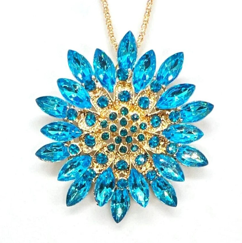 Gold-tone and blue crystal sunflower pendant necklace with link chain