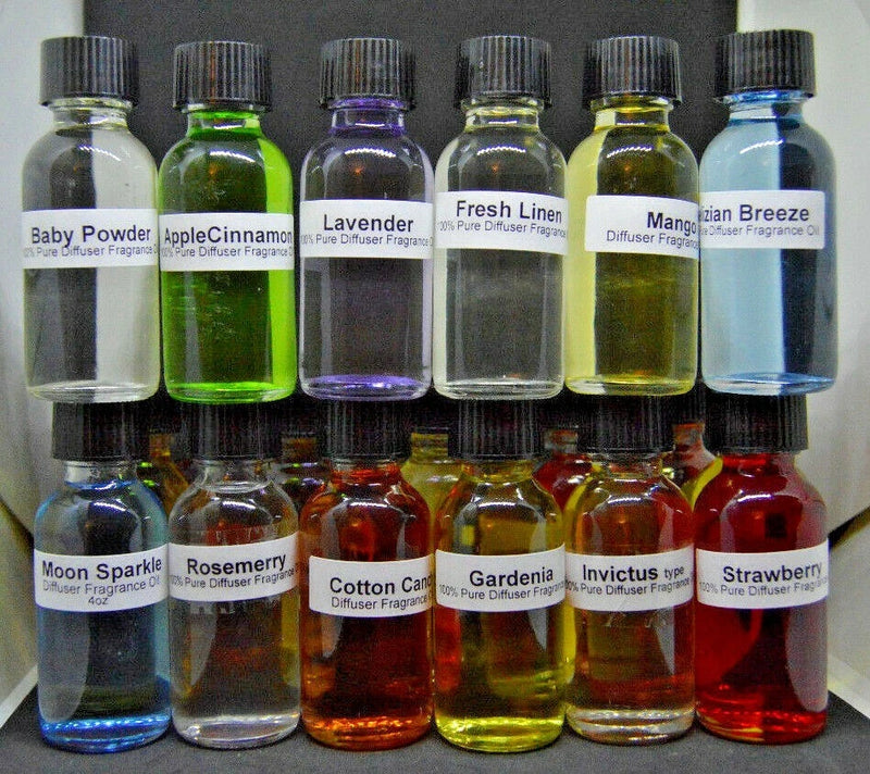 Set of fragrance oil bottles with assorted liquid colors and sealed caps