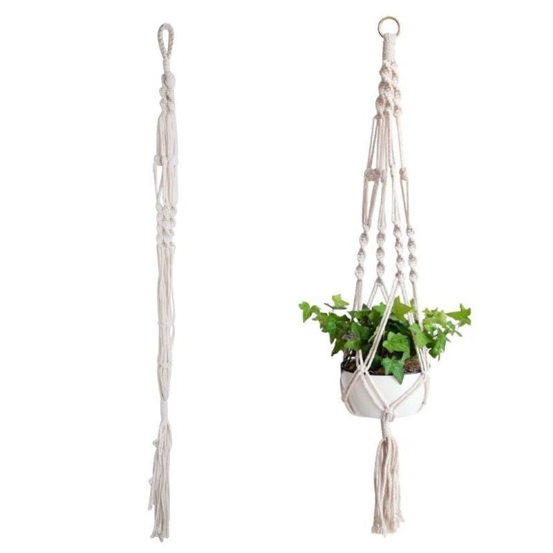 White macrame plant hanger with hanging basket and tassels for potted plants