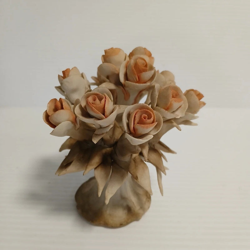 Capodimonte porcelain rose bouquet with cream and peach roses in a small vase