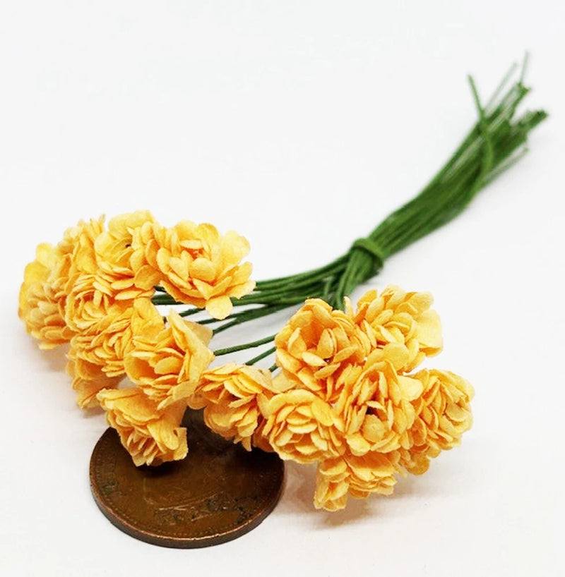 Bunch of orange carnation paper flowers with green stems for dollhouse gardens
