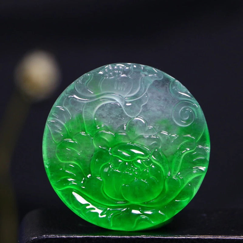 Green jade peony carved round pendant with detailed relief pattern