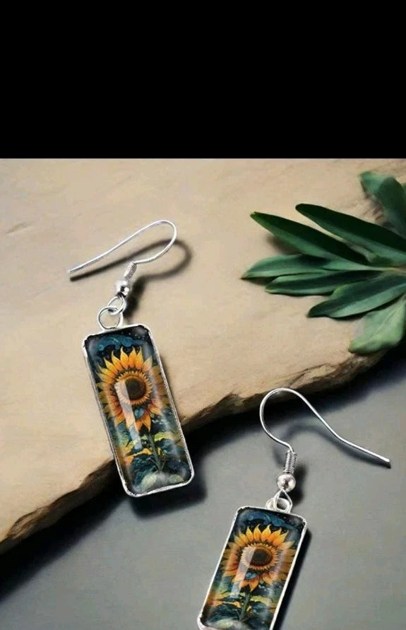 Rectangular sunflower earrings with glass covering, silver-tone hooks