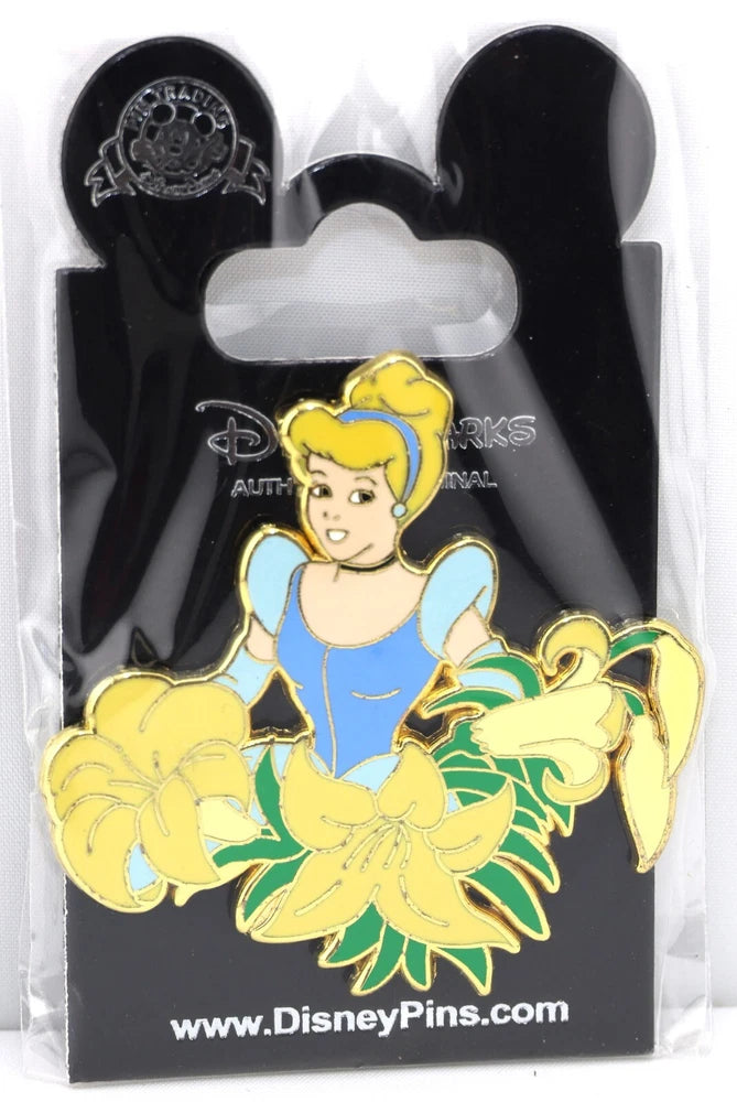 Yellow princess Cinderella enamel pin with flowers and green leaves, gold-tone border