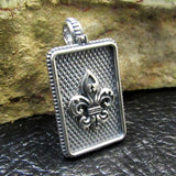 Sterling silver rectangle pendant with textured back and fleur-de-lis lily motif