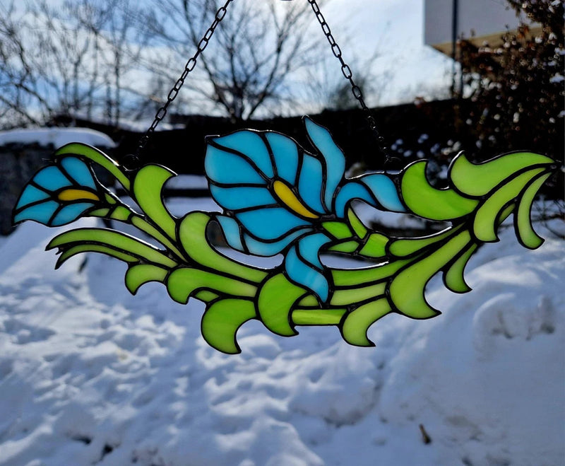 Blue calla lily stained-glass window suncatcher with green leaves, hanging chain