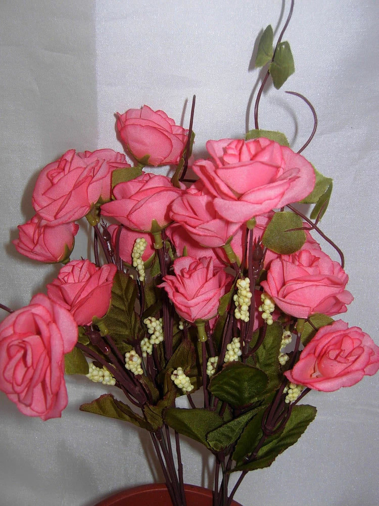 Artificial pink rose flower bouquet with green leaves and wired stems