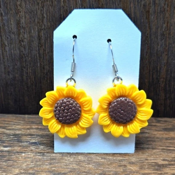 Sunflower dangle earrings with yellow flower petals and dark center, pierced hooks