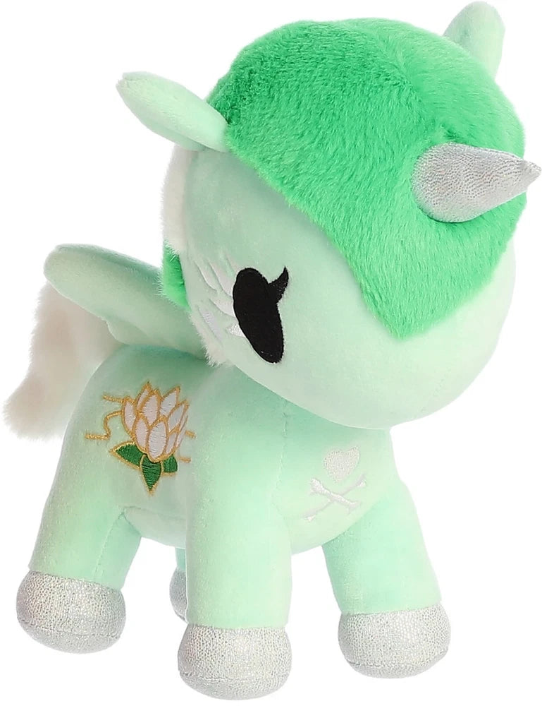 Mint green plush unicorn stuffed animal with flower applique and black eye