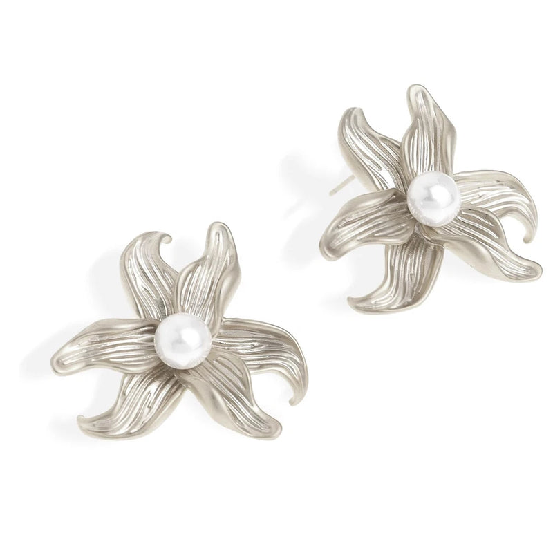 Silver sunflower flower stud earrings with pearl-like center, sculpted petals