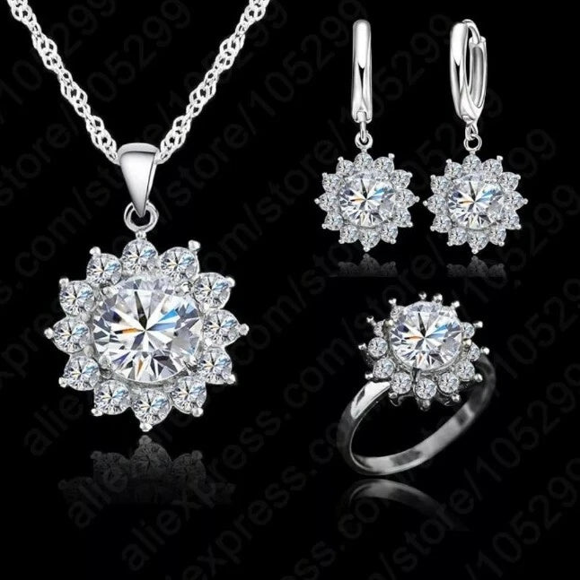 Cubic zirconia jewelry set with pendant, earrings, and ring