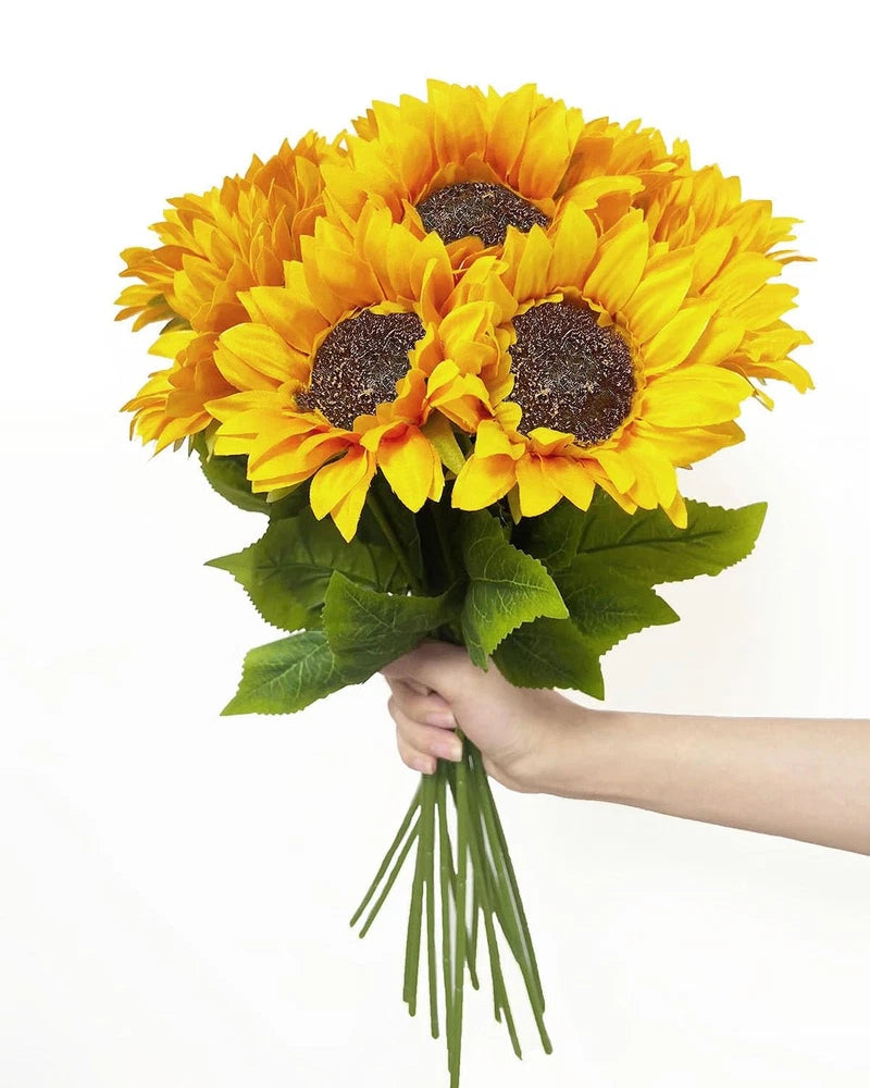 Artificial sunflower bouquet with yellow fabric blooms, dark centers, green leaves and stems
