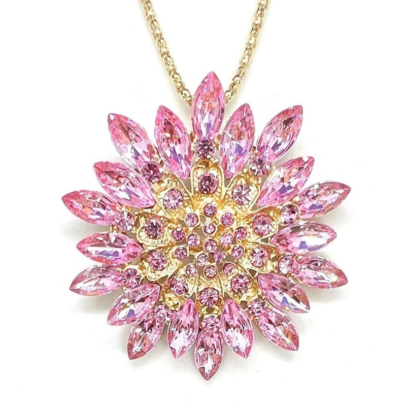 Pink rhinestone flower pendant necklace on gold-tone chain