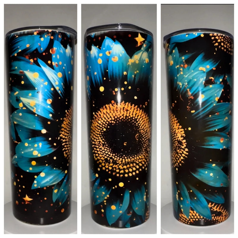 20oz sunflower tumbler with blue petals and golden speckle design on black