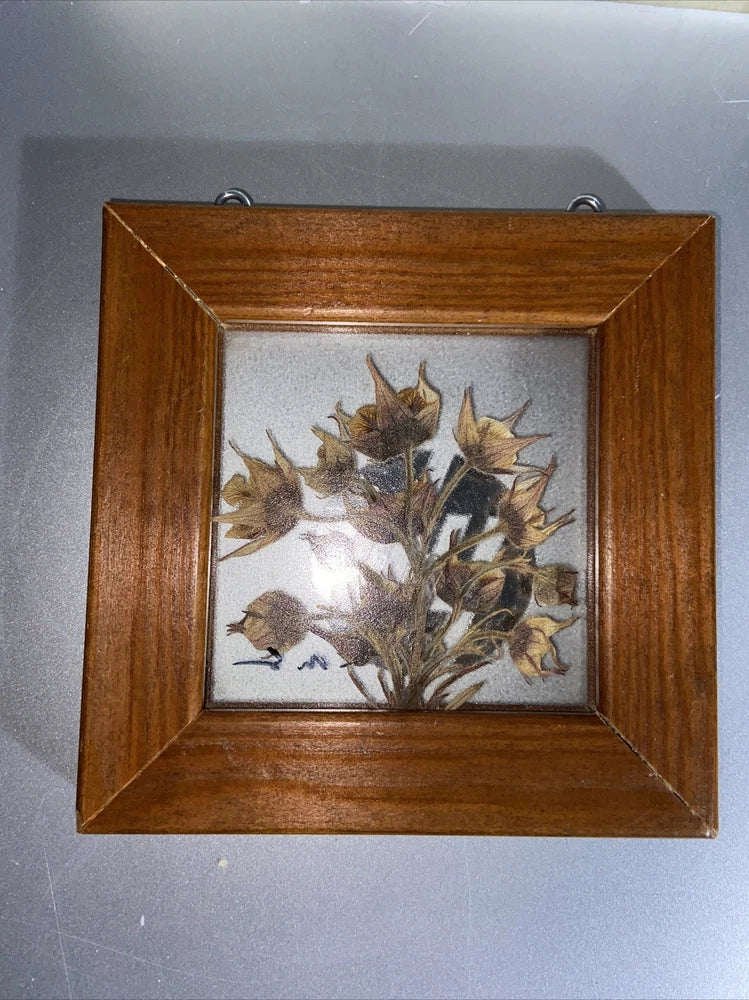 Wood-framed dried flower picture with glass front and mounted dried bouquet