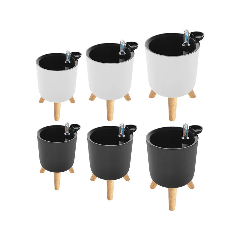 Set of six self-watering flower pots in white and dark with wooden legs