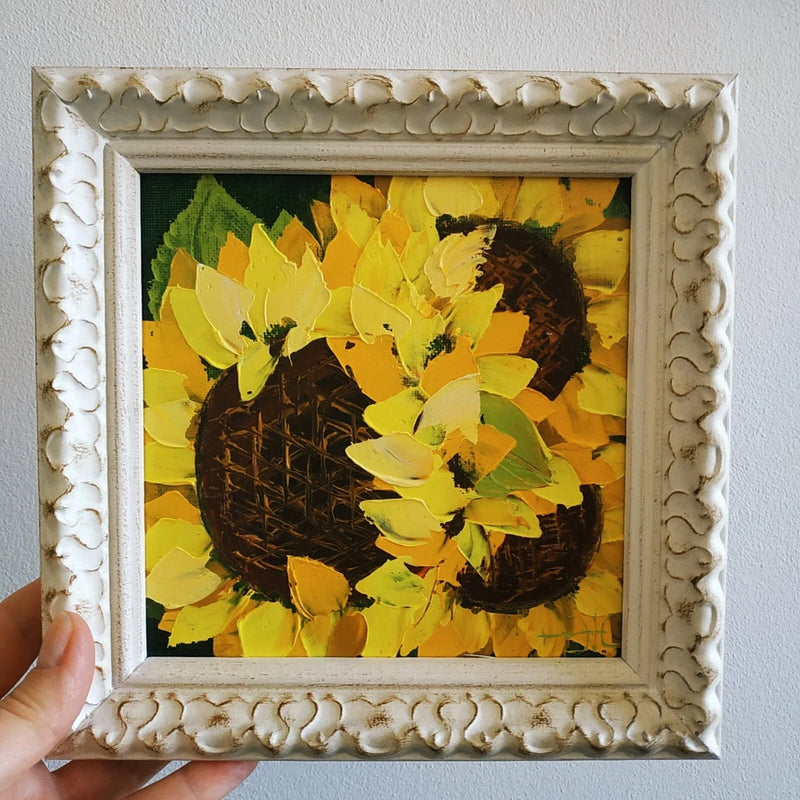 Framed sunflower impasto oil painting with textured yellow petals on dark center