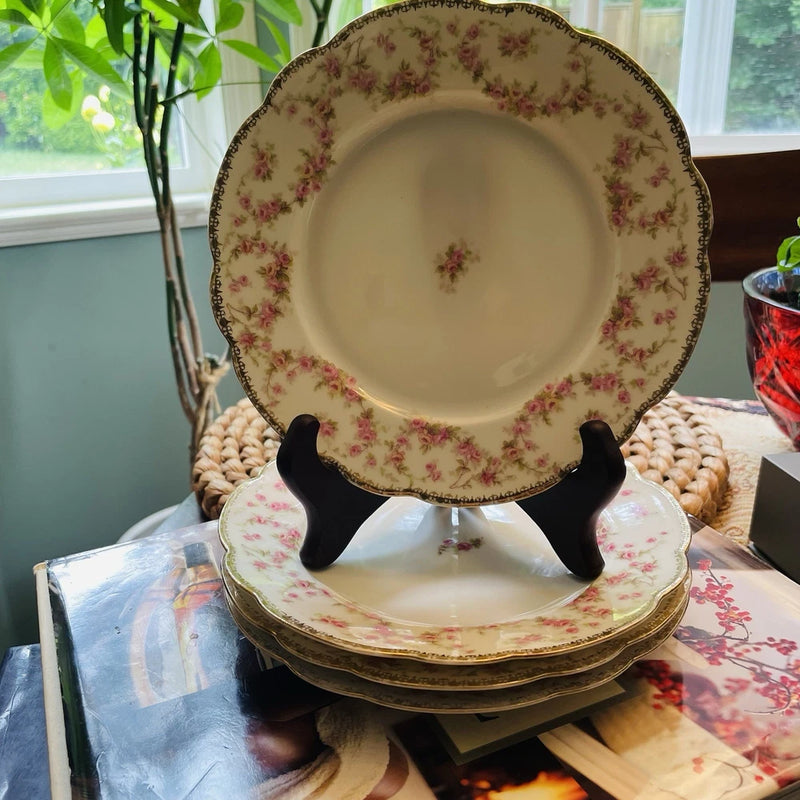 Pink floral scalloped salad plate with gold rim and center flower motif