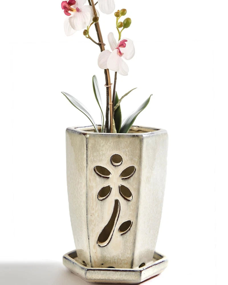 Hexagon ceramic orchid pot with drainage tray, speckled light gray with cutout flower design