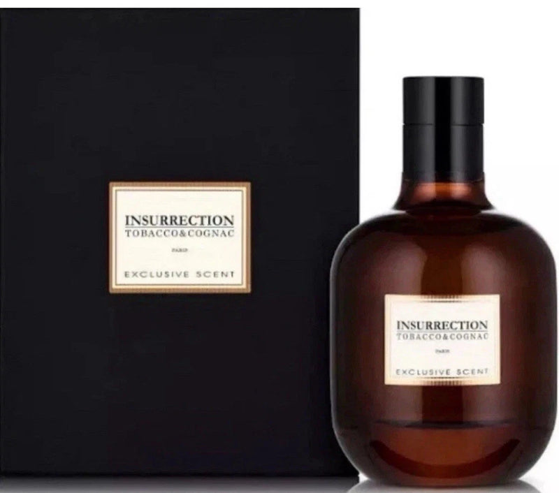 Insurrection eau de parfum bottle, brown glass with black cap and gold label