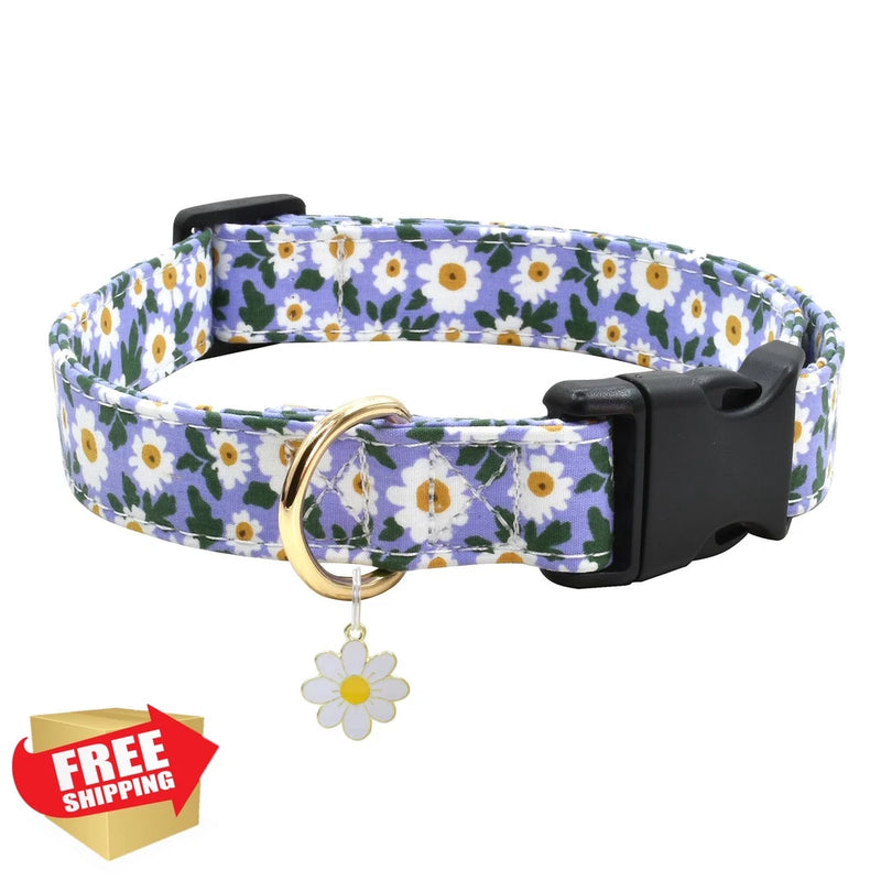 Purple sunflower-print dog collar with black buckle and dangling daisy charm