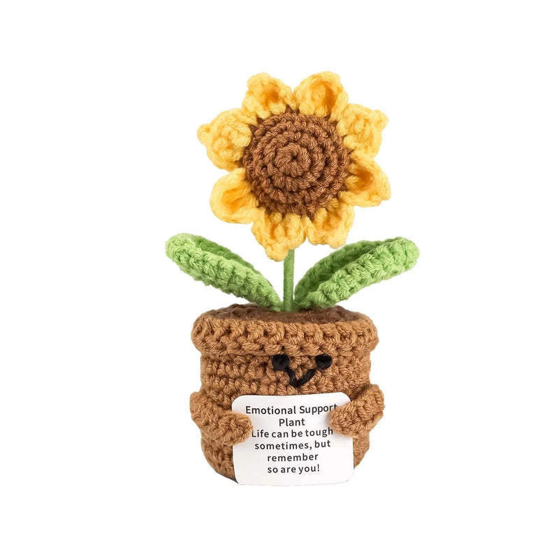 Crocheted sunflower with fabric pot decoration, orange petals and brown stem
