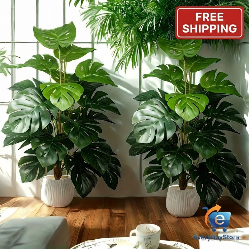 Artificial fiddle leaf fig faux indoor plant with large green leaves in two pots