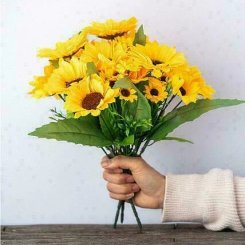 Artificial sunflower bouquet with bright yellow blooms and green leaves in a green-stem bundle