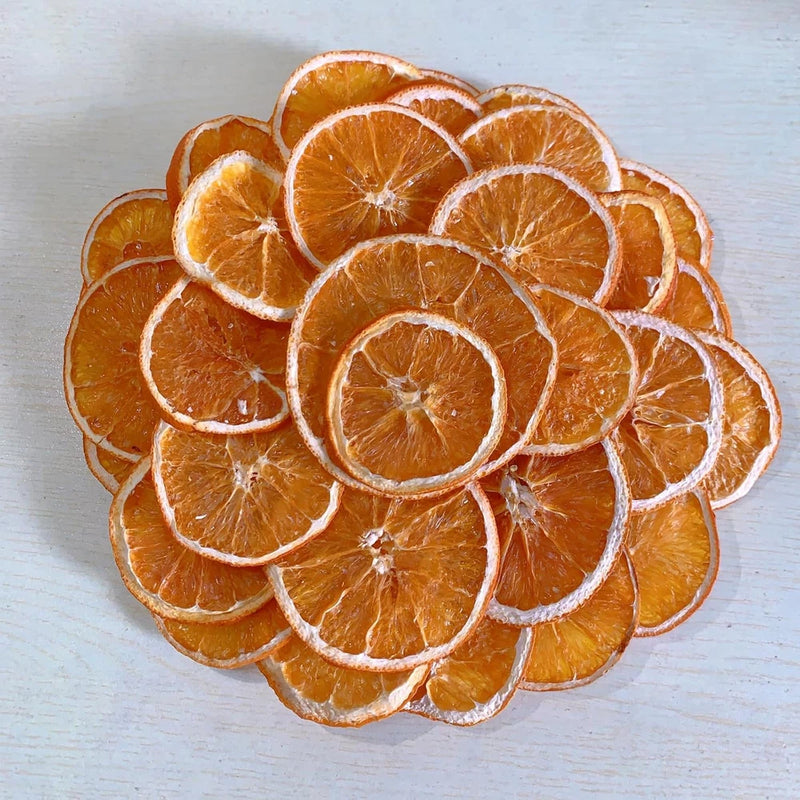 Dried orange slices for crafts, stacked round citrus rounds with visible rinds