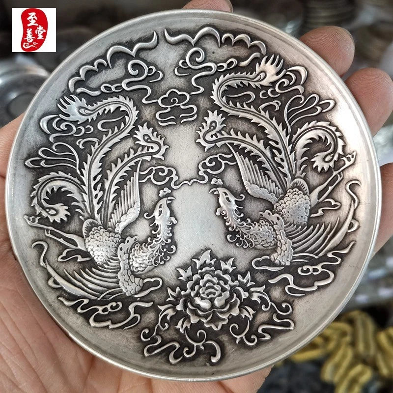 Round silver-toned metal tea tray plate with carved phoenix and peony floral pattern