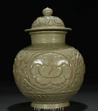 Light green porcelain pot jar with lidded top and raised peony floral relief