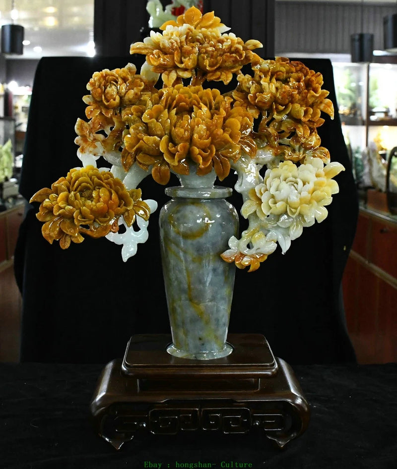 Carved jade peony flower vase statue with yellow and white blossoms, green body