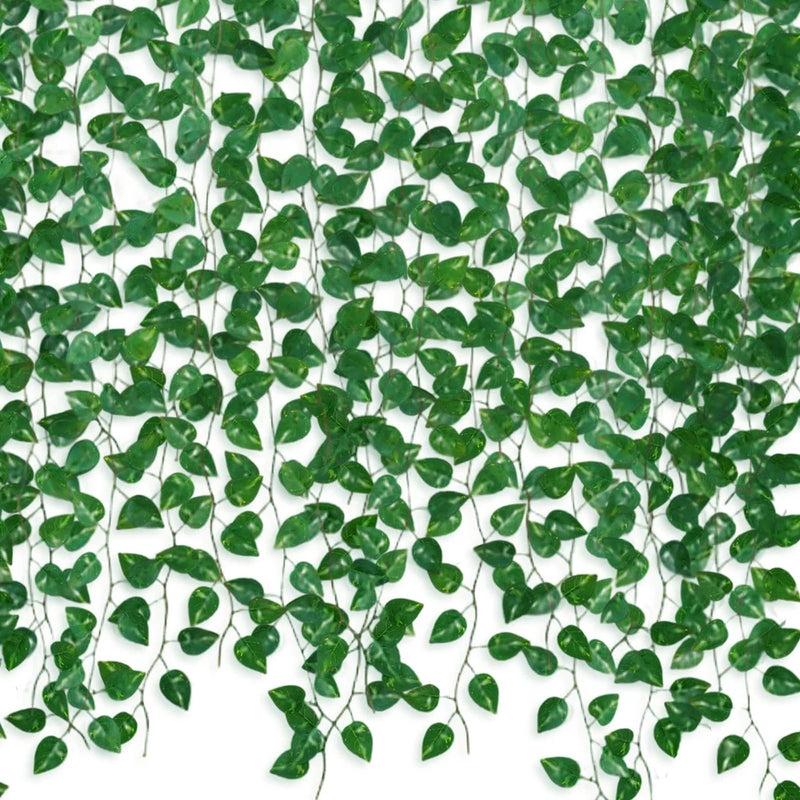 Artificial green vine plant foliage with clusters of small leaf tips, dense decorative garland