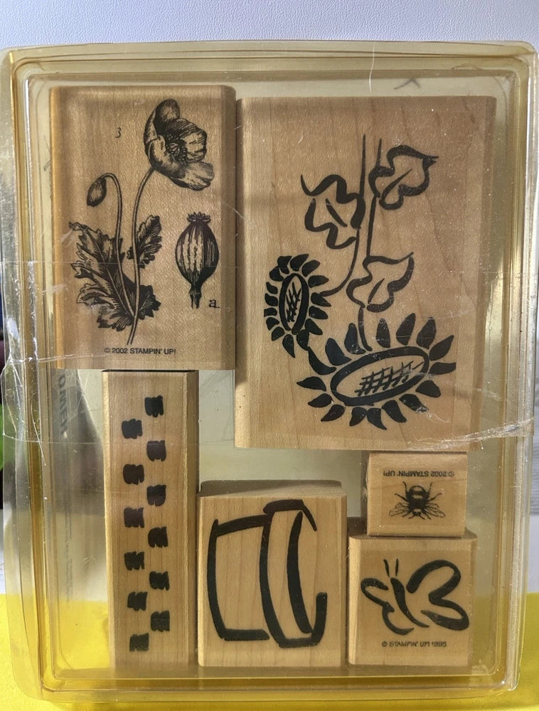 Floral and bee rubber wood stamp set with sunflower, leaves, and small blocks in case