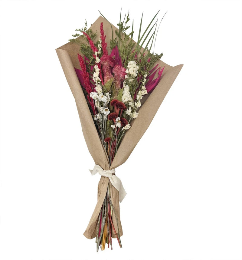 Dried floral love bouquet wrapped in kraft paper with pink, red, and white blooms