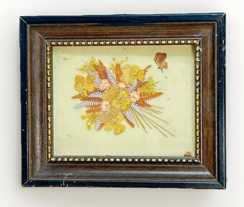 Framed pressed flower botanical wall art with wood frame and dried floral arrangement