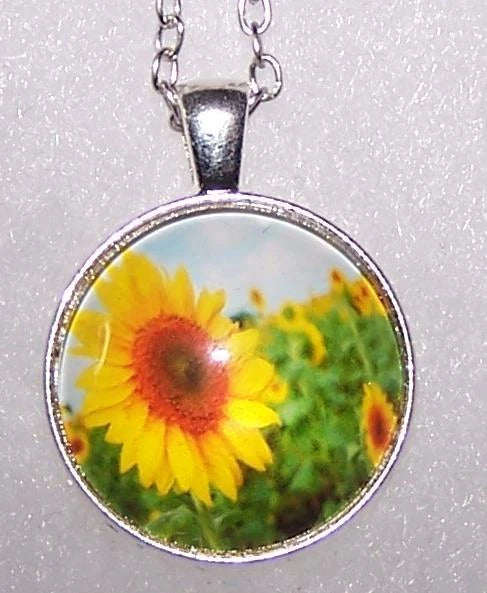 Silver sunflower charm pendant necklace with round photo-style glass pendant