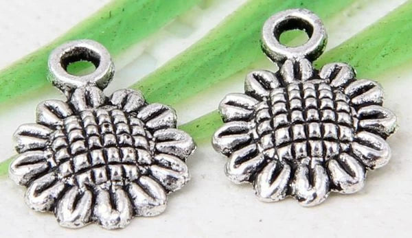 Antique silver sunflower flower charm pair with top loop for jewelry making