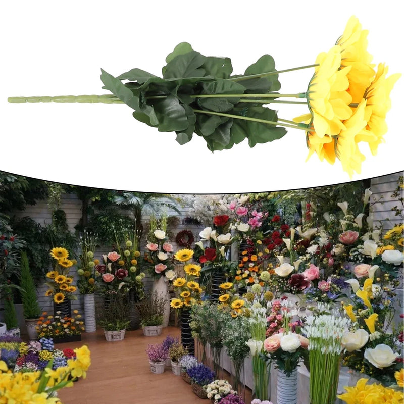 Artificial sunflower flower bouquet with yellow blooms and green leaves