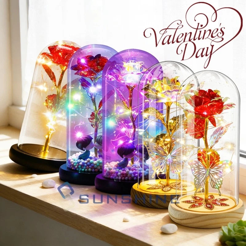 Valentine's rose gift under clear glass dome with LED lights and decorative petals