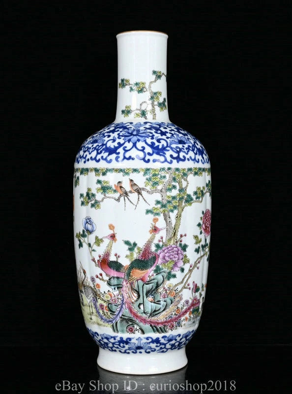 White porcelain vase with blue rim and colorful bird, peony and floral scene