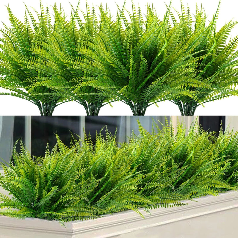 Artificial Boston fern bundles with dense green fronds on stems