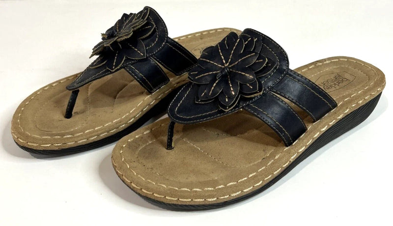 Women’s black thong sandals with floral applique and toe-post straps