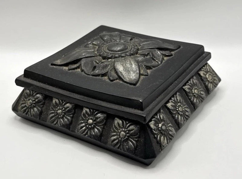 Square black ceramic jewelry box with raised sunflower on lid, embossed floral sides