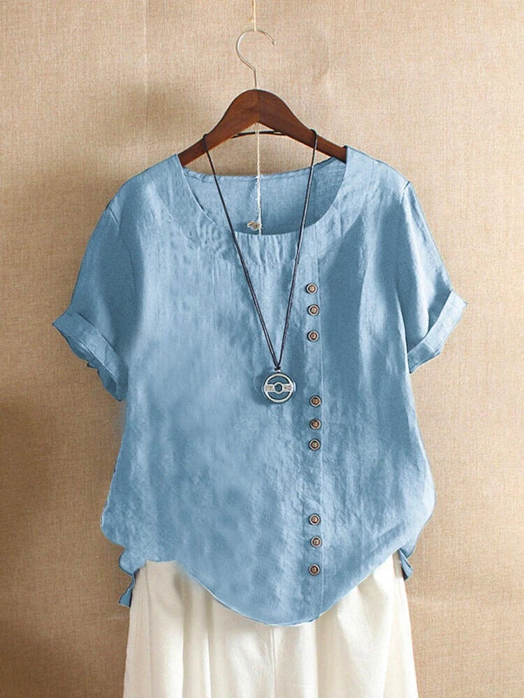 Light blue short-sleeve tunic blouse with button-front placket and V-neck