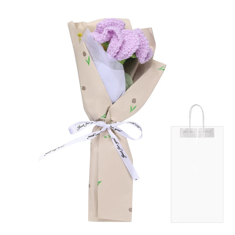 Handmade crochet flower bouquet with purple carnations, wrapped in kraft paper